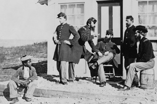 Black boy among Union Officers during Civil War
